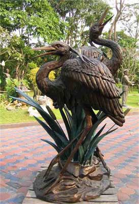 Large Double Herons in Leaves