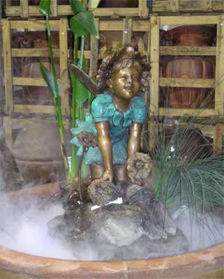 Kneeling Fairy in Flowers