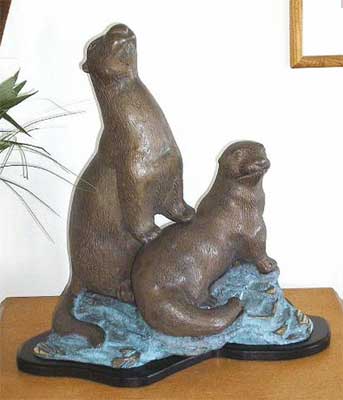 Two Otters on Rock